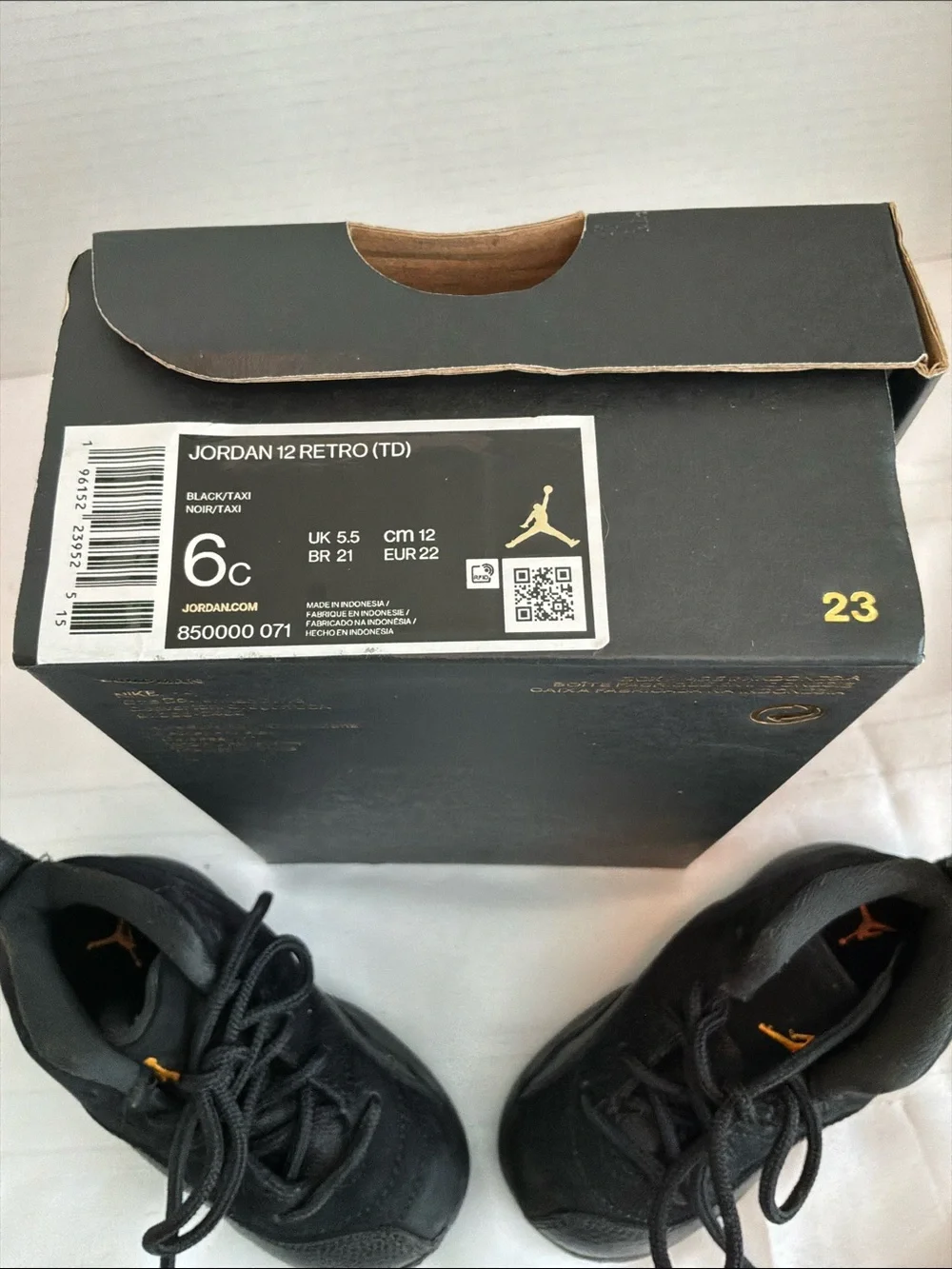 Jordan Kids Black Retro 12 Sneakers size 6c with gold sticker with box